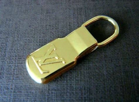 authentic louis vuitton zipper pull|authentic louis vuitton lock key.